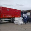 Marfa adusă e dată jos din camioanele românești și urcată în tiruri ucrainene