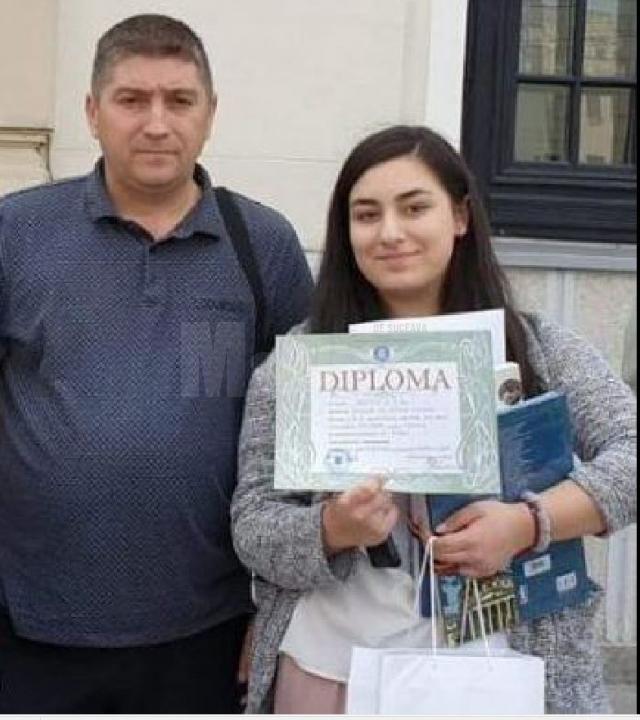 Simina Teodora Buculei impreuna cu prof. Vasiliu Anișor