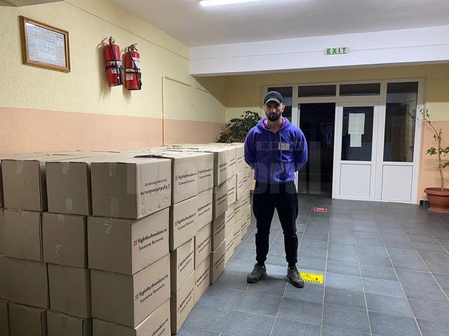 Andrei Bacos, alături de pachetele cu ajutoare