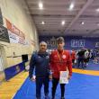 Luptătorul Iulian Lungu şi antrenorul Florin Rusu