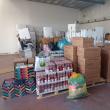 Haine și patru tone de alimente oferite unor copii cu probleme, cu sprijinul unei fundații din Italia