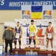 Reputatul fost luptător Ștefan Rusu și cei doi sportivi de la CSM Suceava care au urcat pe podium