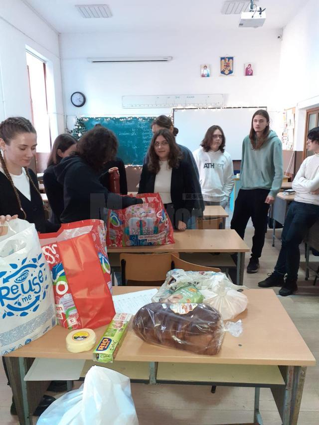 Familii nevoiașe, refugiați și copii sărmani, ajutați în prag de sărbători de Colegiul „E. Hurmuzachi”