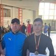 Antrenorul Valerică Gherasim alături de sportivul Iustin Vodă