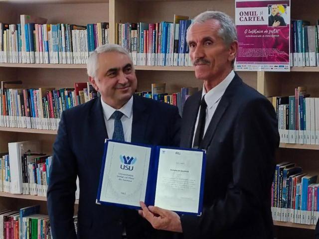 Diploma de Excelenţă oferită de conducerea USV omagiatului Petre Ghervan