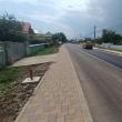 Lucrări de asfaltare pe strada principală din Moara Nica și Moara Carp