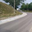 Strada Dumbrăvii din satul Tișăuți a fost asfaltată și are și rigole betonate de scurgere a apei