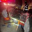 Bărbat prins sub un tractor care s-a răsturnat