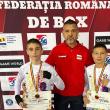 Antrenorul Andu Vornicu incadrat de cei doi tineri campioni