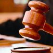 Arestați după ce au intrat de două ori în casa unei bătrâne, în căutare de bani