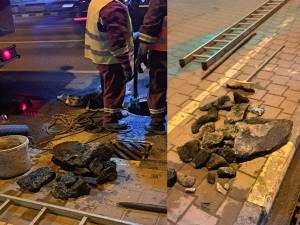 Deșeurile de beton și asfalt care blocau canalul colector de sub principala artera de circulație a Sucevei