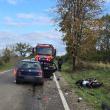 Impact violent între motocicletă și mașină