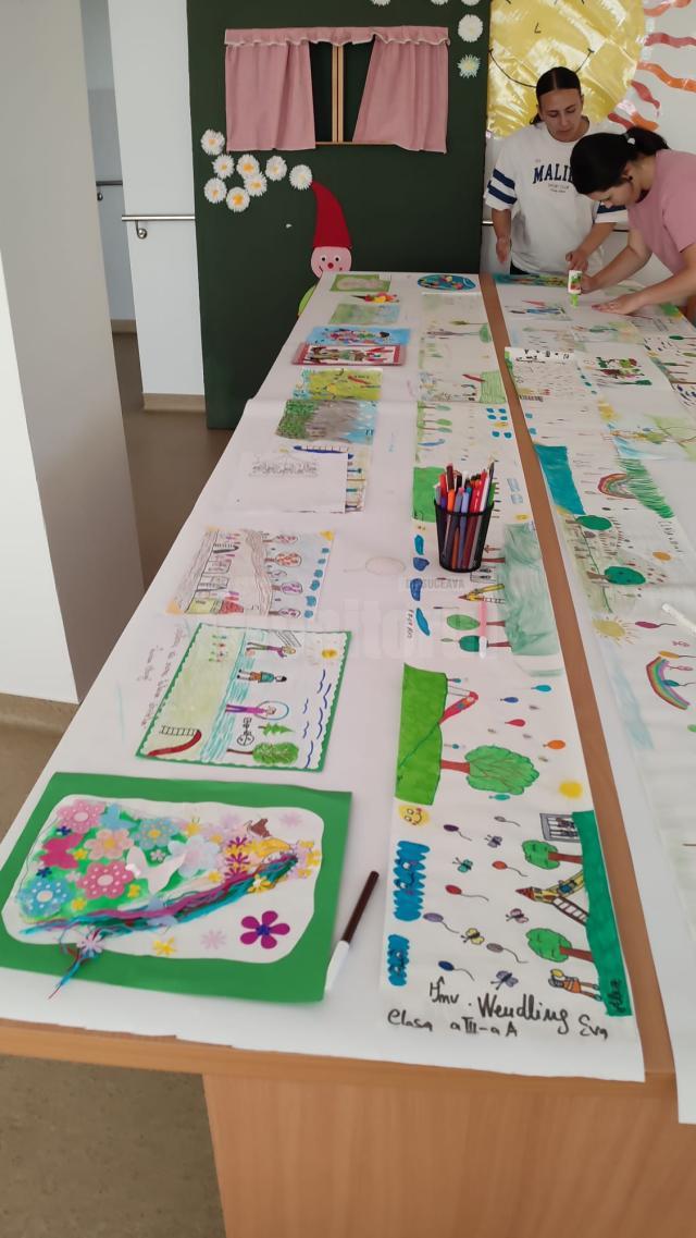 Lucrări realizate de elevi humoreni, ilustrând viziuni creative asupra copilăriei, empatiei și prieteniei, adunate într-o expoziție