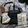 În cadrul perchezițiilor au fost ridicate și sume de bani