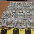 Dolarii ascunși în cartușele de țigări