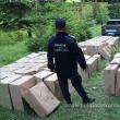 Țigări în valoare de peste 1,7 milioane de lei, ascunse de contrabandiști în pădure și descoperite de polițiștii de frontieră