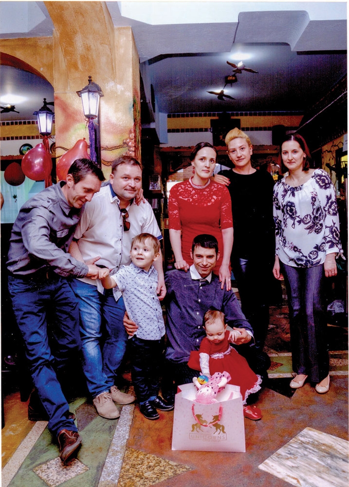 O familie fericită. Maria Nuțu la 1 an.